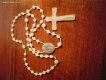 : Fingerrosaries,     .   